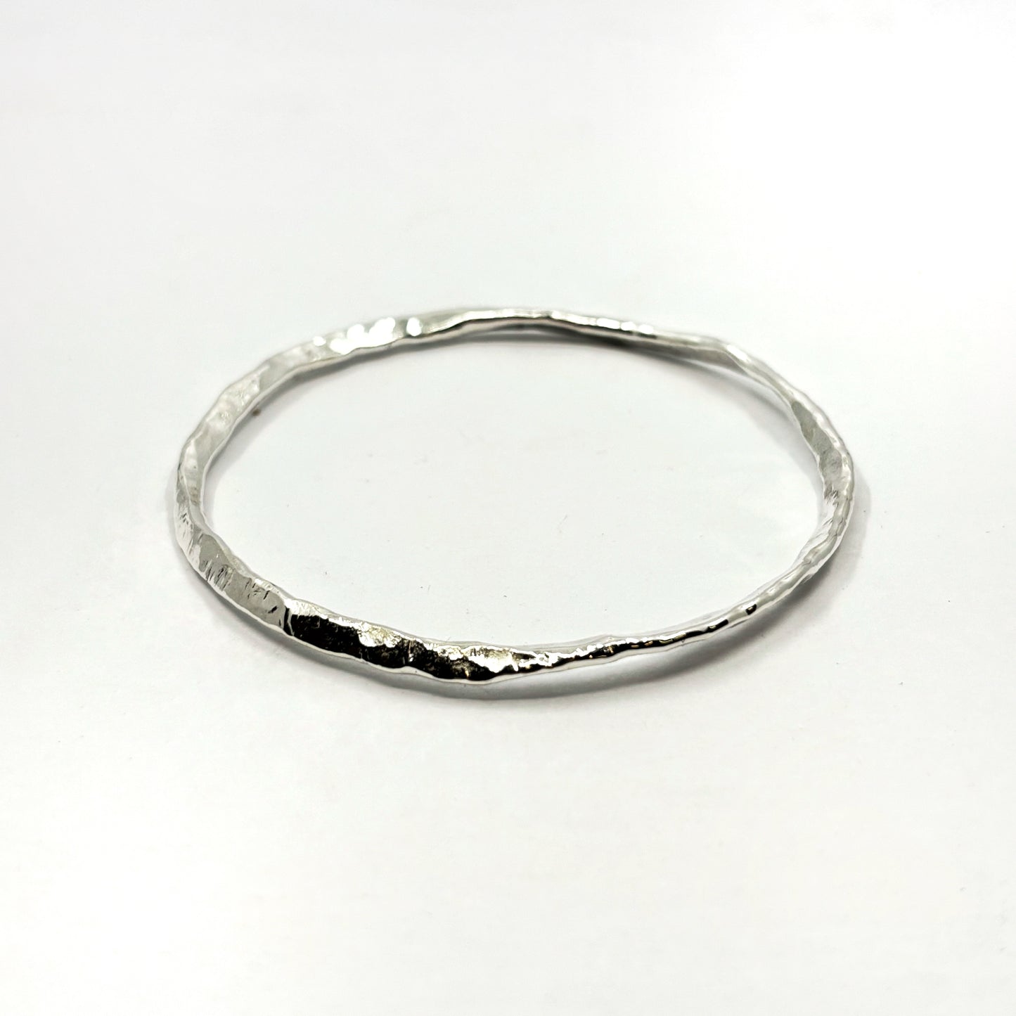 Spiral hammered bangle